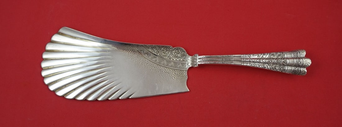 Sterling silver ice cream knife with wavy fluted blade Luxembourg pattern 11 inch: Sterling silver ice cream knife with wavy fluted blade Luxembourg pattern 11 inch This is a sterling silver ice cream knife in the Luxembourg pattern by Shiebler, dating from 1850 to 1899. The knife f