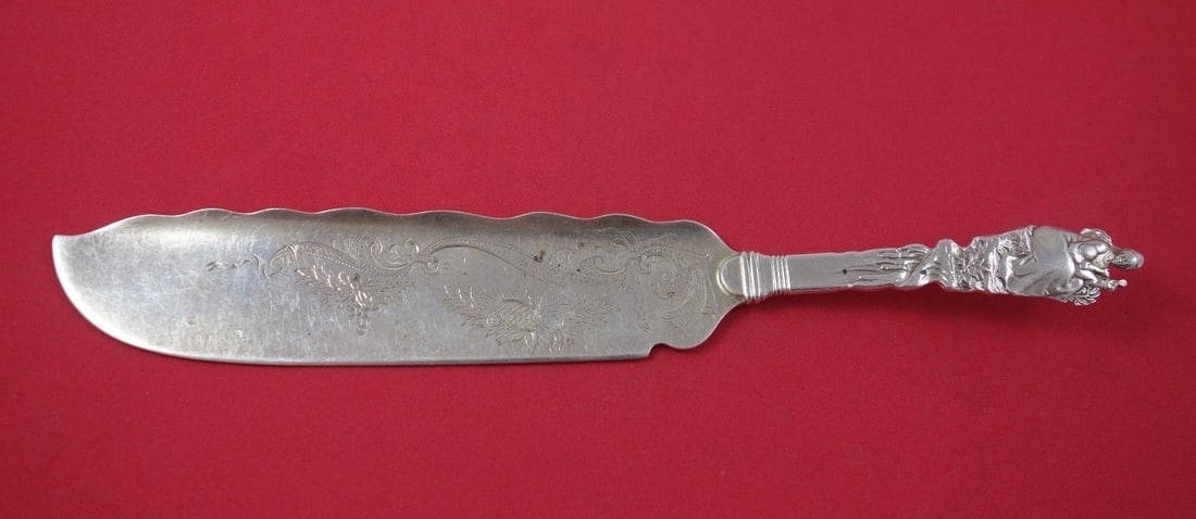 Sterling Silver Ice Cream Slice Gorham Nuremberg Bright Cut 10 3/4: Sterling Silver Ice Cream Slice Gorham Nuremberg Bright Cut 10 3/4 Sterling silver ice cream slice in the Nuremberg pattern by Gorham, featuring a flat handle and bright-cut decoration. It is not mono