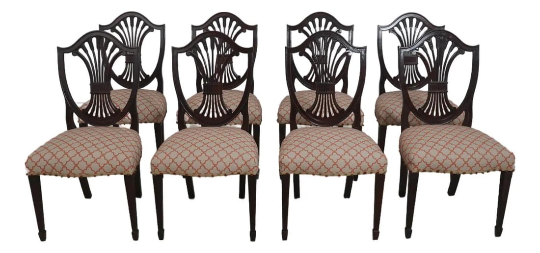 Stickley Mahogany Federal Shield Back Dining Chairs Set of 8: Stickley Mahogany Federal Shield Back Dining Chairs Set of 8 This set includes eight Stickley Federal shield back dining chairs crafted from mahogany. Featuring fine carved details and a design inspir
