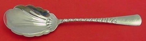 Gorham Colonial Sterling Silver Shell Berry Serving Spoon 8 7/8": Gorham Colonial Sterling Silver Shell Berry Serving Spoon 8 7/8" Sterling silver berry spoon in the Colonial pattern by Gorham, featuring a shell-shaped bowl and an 8 7/8 inch length. It is monogramme