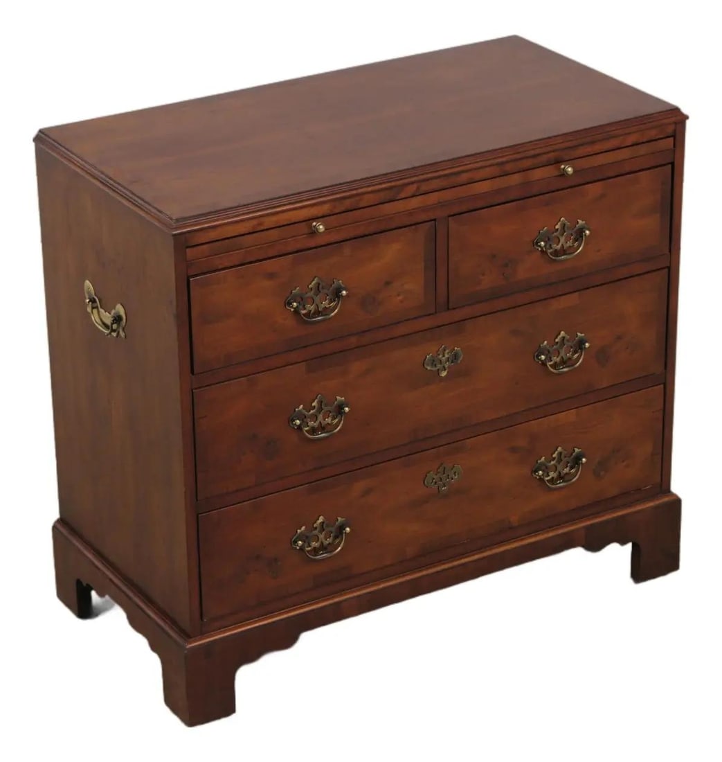 George III Style Yew Wood Chest with Four Drawers and Pull Out Tray: George III Style Yew Wood Chest with Four Drawers and Pull Out Tray This Hekman bachelor's chest of drawers features a classic George III style, showcasing beautiful yew wood throughout and detailed i