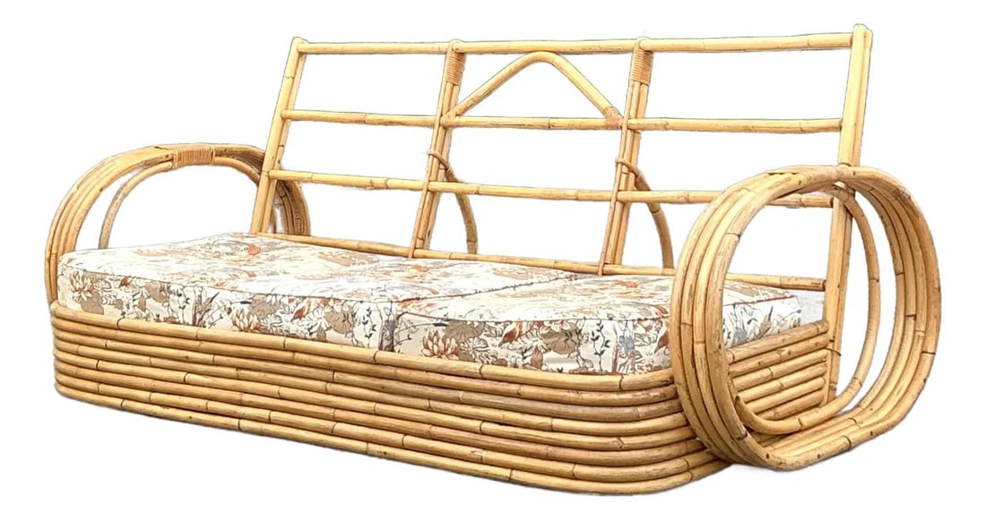 Vintage Coastal Rattan Circle Sofa with Floral Cushions: Vintage Coastal Rattan Circle Sofa with Floral Cushions Transform your living space with the Vintage Coastal Bent Rattan Circle Sofa, a remarkable piece that embodies tropical elegance and bohemian lu