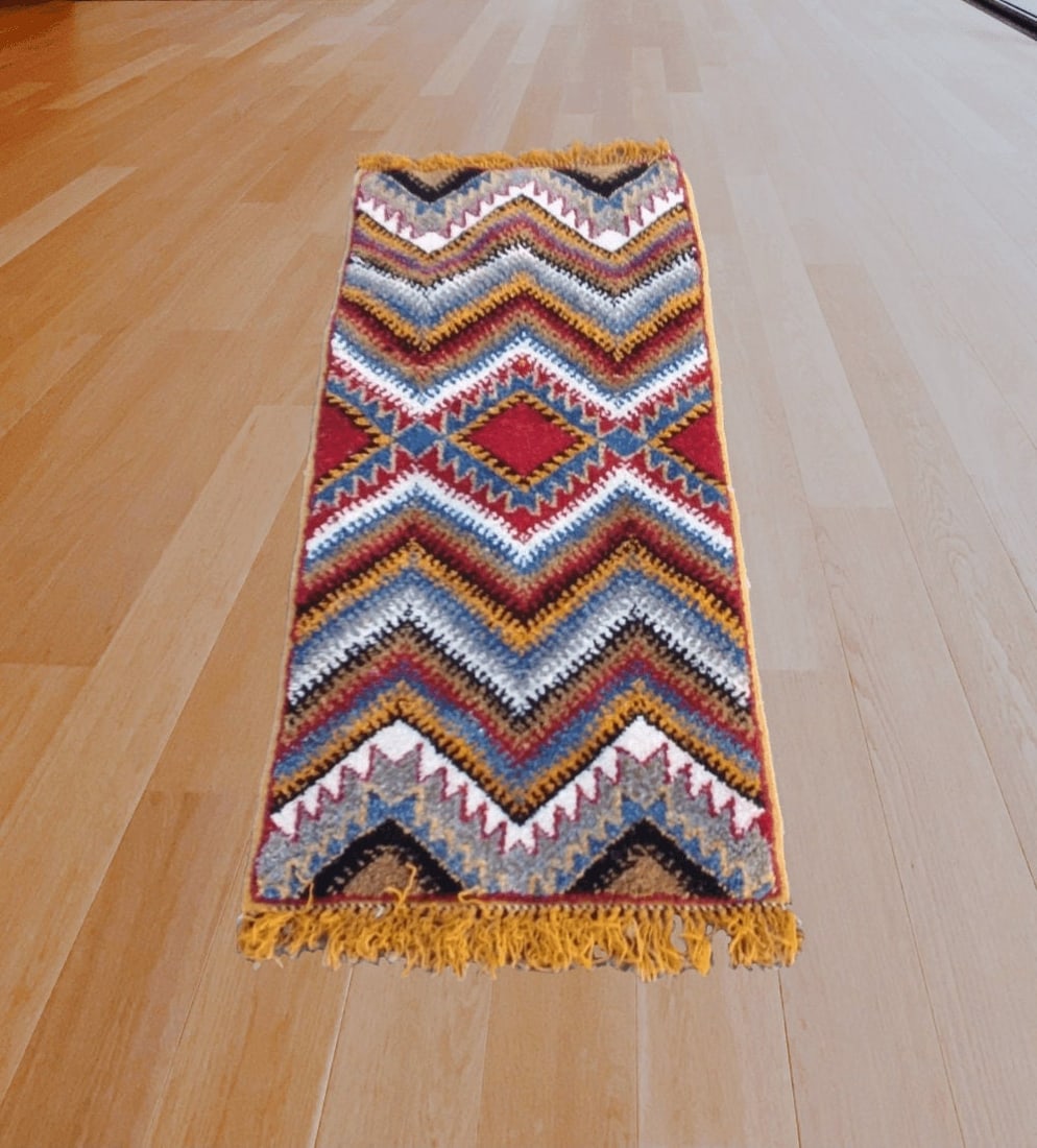 Taznakht Handmade Wool Berber Runner Rug 158 x 69cm: Taznakht Handmade Wool Berber Runner Rug 158 x 69cm This exquisite rectangle handmade Berber rug is crafted in Taznakht by local tribal women, showcasing their artistry and attention to detail. Made f