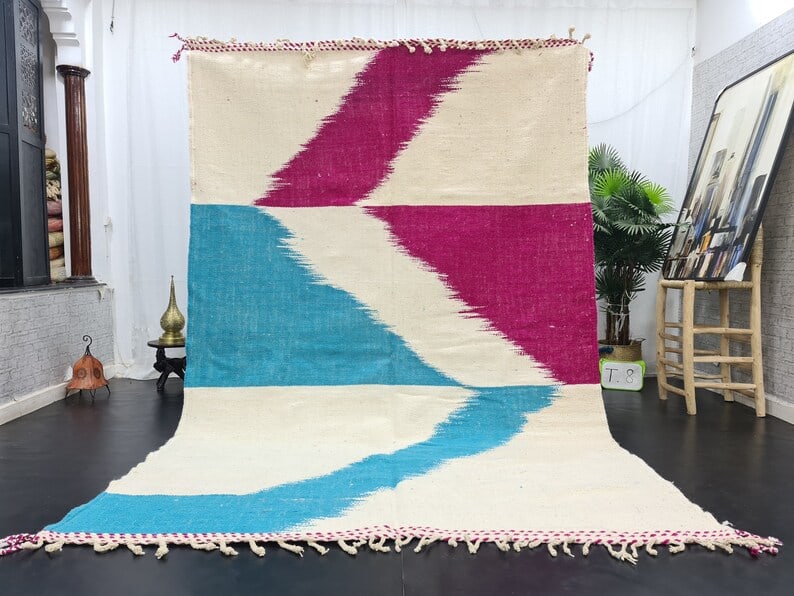 Authentic Handwoven Colorful Rug 100% Sheep Wool Morocco 10 x 6.56 Feet: Authentic Handwoven Colorful Rug 100% Sheep Wool Morocco 10 x 6.56 Feet This authentic colorful rug is handwoven in the Atlas Mountains by skilled Berber women weavers, utilizing traditional tools and