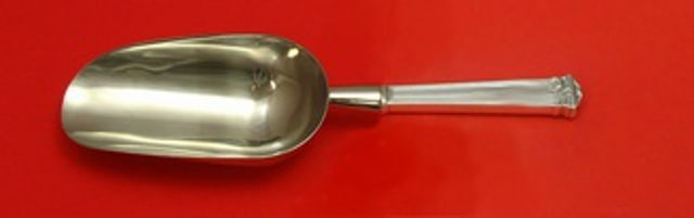 Theseum Sterling Silver Ice Scoop 9 3/4" by International: Theseum Sterling Silver Ice Scoop 9 3/4" by International This exquisite ice scoop is crafted from sterling silver and features a hollow handle with a stainless steel implement. Designed in the elegan