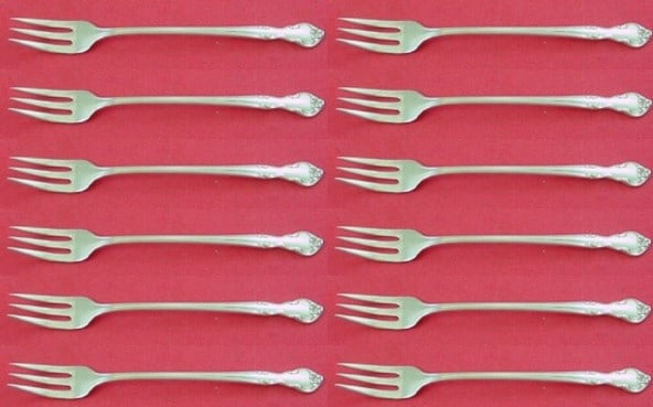 Easterling American Classic Sterling Silver Cocktail Forks Set 12 Piece: Easterling American Classic Sterling Silver Cocktail Forks Set 12 Piece Elevate your dining experience with this exquisite 12-piece cocktail fork set from Easterling, featuring the elegant American Cl