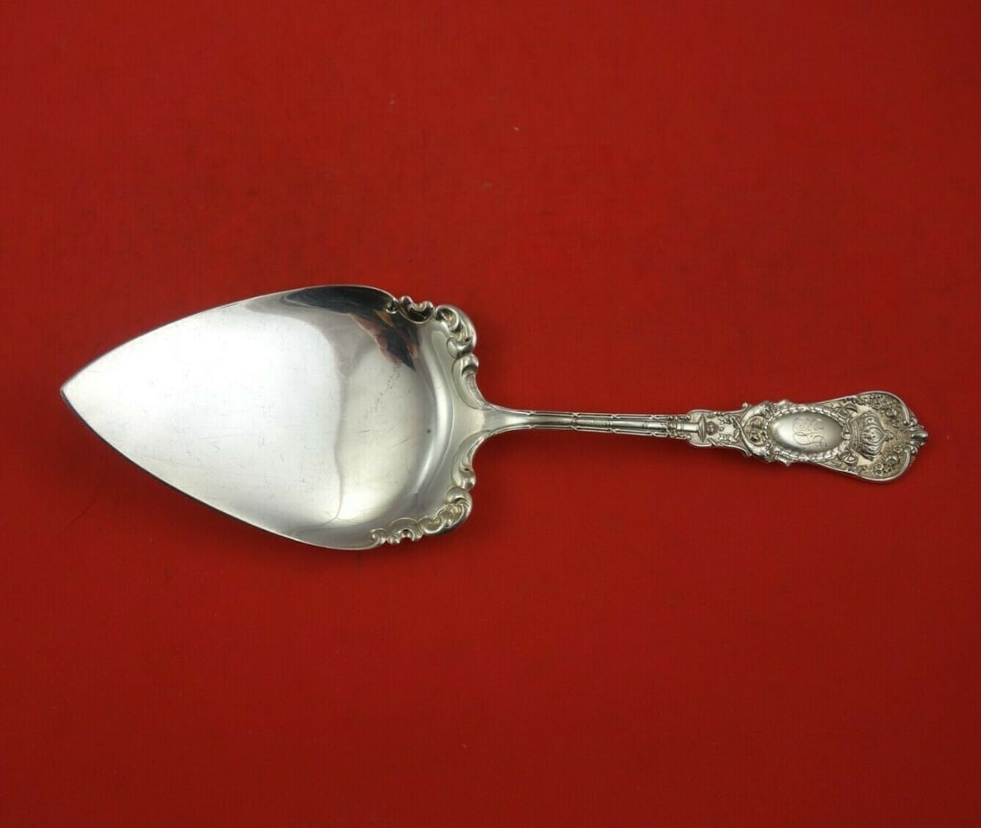 Durgin Empire Sterling Silver Pie Server 9.5 Inch Flat Handle: Durgin Empire Sterling Silver Pie Server 9.5 Inch Flat Handle Experience timeless elegance with this Empire by Durgin Sterling Silver Pie Server. Crafted from all sterling silver, this exquisite piece