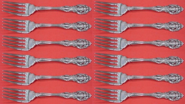 12 Gorham La Scala Sterling Silver Salad Forks 6 1/2": 12 Gorham La Scala Sterling Silver Salad Forks 6 1/2" Sterling silver salad fork set in the La Scala pattern by Gorham. This 12-piece set measures 6 1/2 inches and was introduced in 1964. The design f