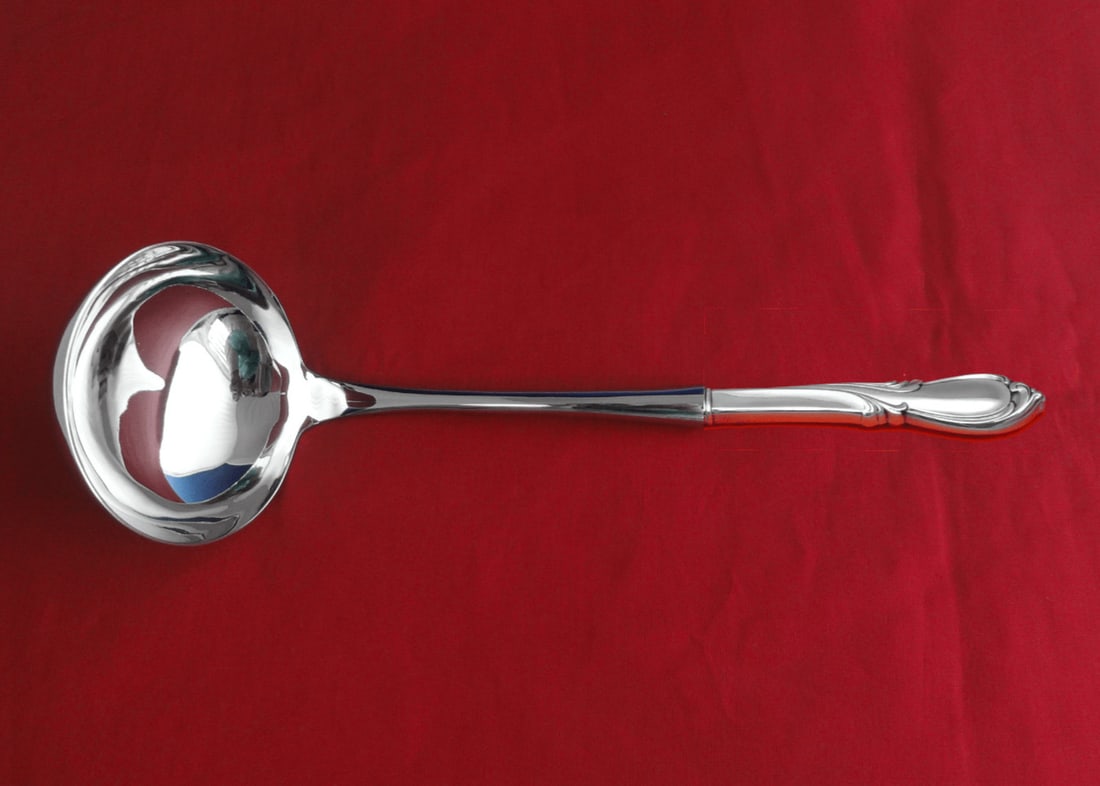 International Sterling Silver Rhapsody New Soup Ladle 10.5 Inch: International Sterling Silver Rhapsody New Soup Ladle 10.5 Inch This impressive soup ladle from the Rhapsody New pattern by International Sterling is a beautiful example of craftsmanship. Made from hi