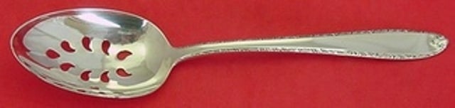 Alvin Southern Charm Sterling Silver Slotted Spoon 9-Hole Custom 8.5": Alvin Southern Charm Sterling Silver Slotted Spoon 9-Hole Custom 8.5" This exquisite Southern Charm slotted serving spoon by Alvin is crafted from high-quality sterling silver, showcasing a beautiful 