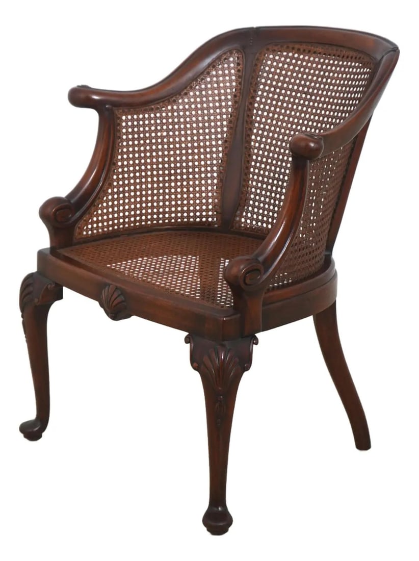 French Style Carved Cane Accent Chair with Queen Anne Legs: French Style Carved Cane Accent Chair with Queen Anne Legs Vintage French carved cane tub chair with high quality construction, French style Queen Anne legs, and pad feet. It is un-marked as to manufa