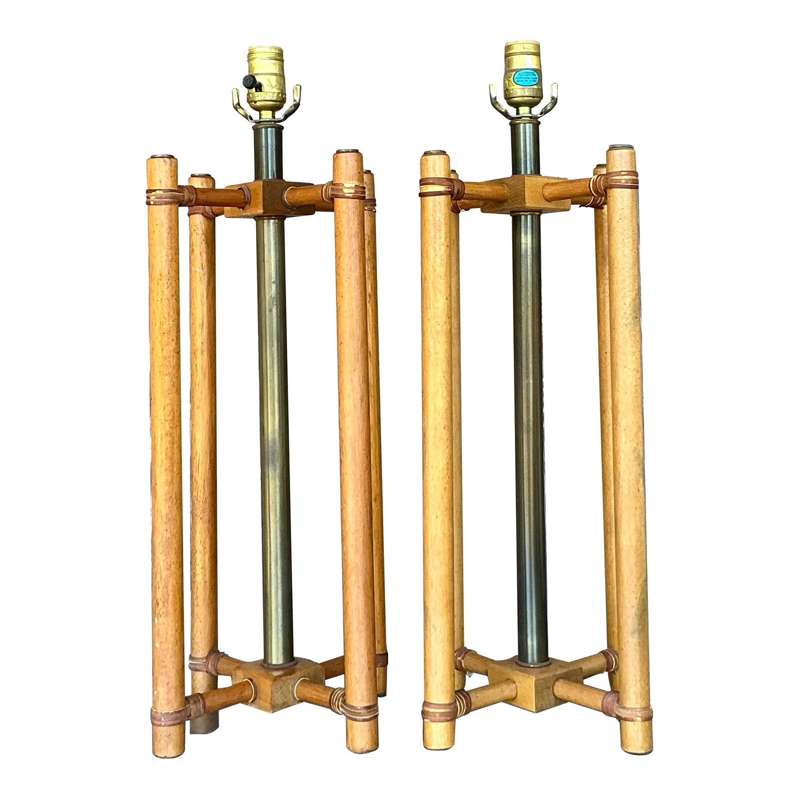 Vintage Boho Rattan Lamps Pair with Brass Accents 22.75 H: Vintage Boho Rattan Lamps Pair with Brass Accents 22.75 H Enhance your home decor with this exquisite pair of vintage boho wrapped rattan lamps. Featuring a sculptural open-frame design, these lamps e