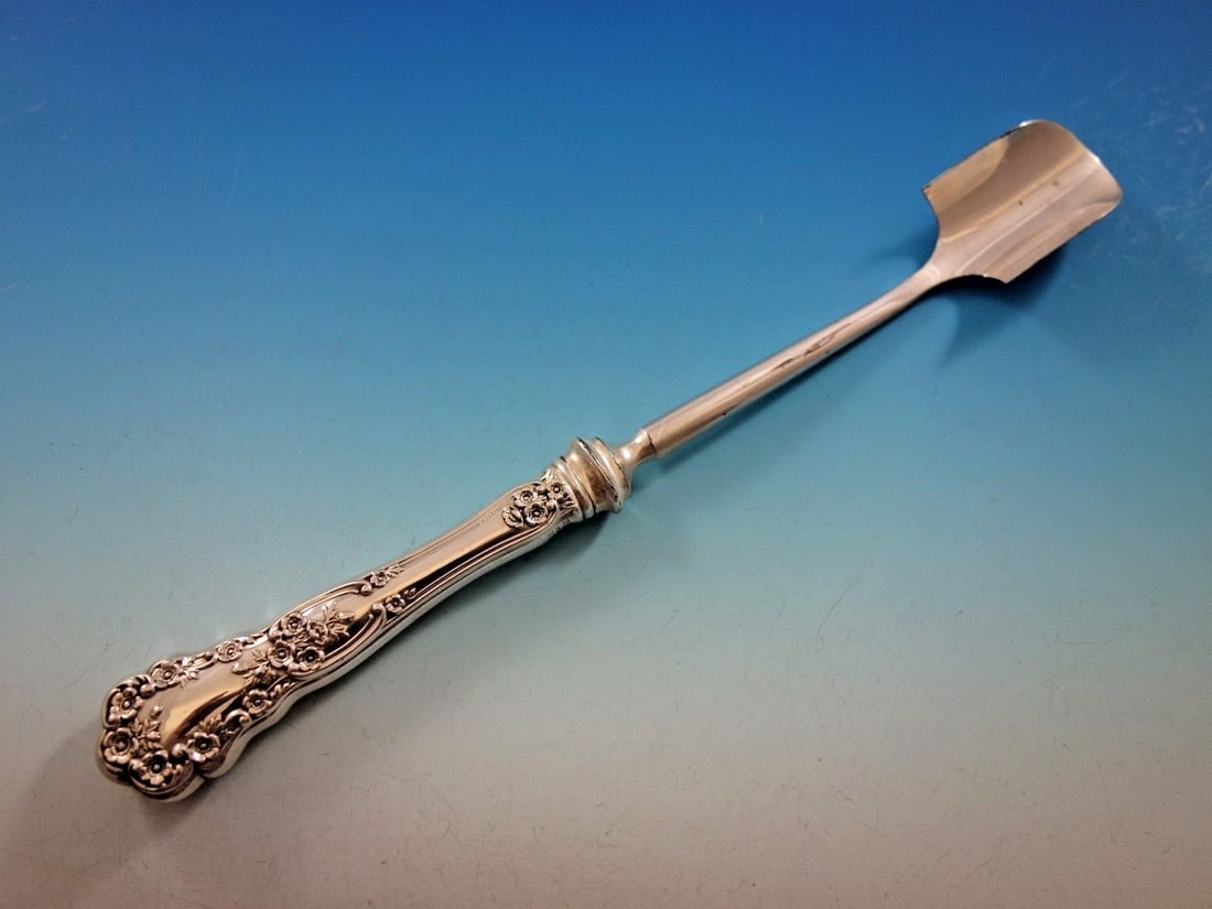 Gorham Buttercup Sterling Silver Cheese Scoop 9 3/4" Hollow Handle: Gorham Buttercup Sterling Silver Cheese Scoop 9 3/4" Hollow Handle This exquisite Buttercup cheese scoop by Gorham is a stunning addition to any serving collection. Crafted from sterling silver, this 