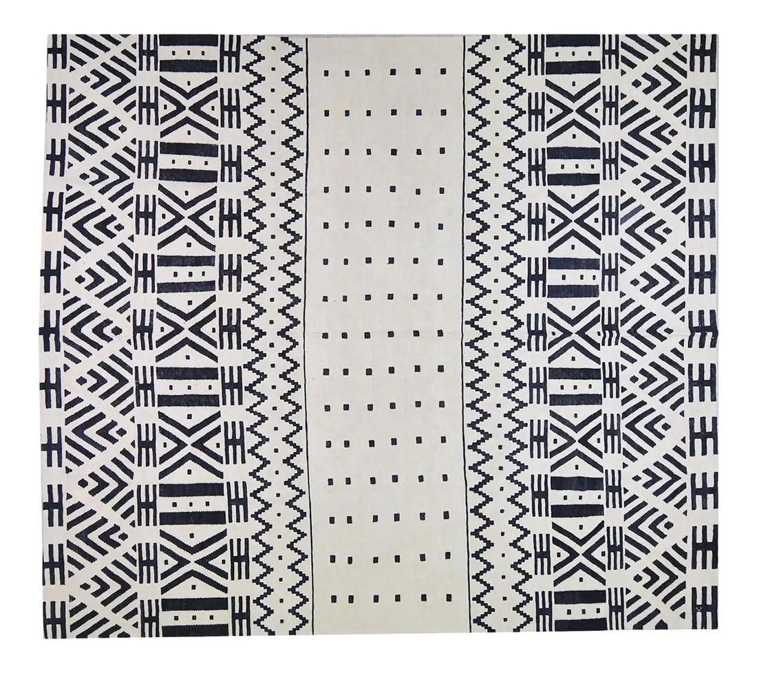Moroccan Tribal Wool Kilim Rug in Natural White 8'6" x 9'7": Moroccan Tribal Wool Kilim Rug in Natural White 8'6" x 9'7" This vintage Moroccan tribal kilim is hand woven from organic wool and features natural colors with a fine weave. The piece showcases tradit