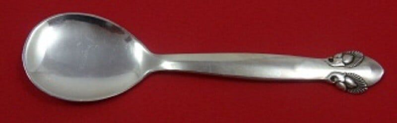 Georg Jensen Bittersweet Sterling Silver Ice Cream Spoon 5 1/4": Georg Jensen Bittersweet Sterling Silver Ice Cream Spoon 5 1/4" Indulge in a touch of elegance with this Bittersweet by Georg Jensen Sterling Silver Ice Cream Spoon. Measuring 5 1/4 inches, this exqui