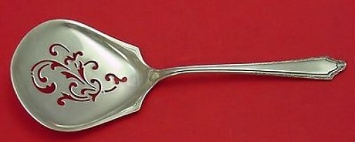 Towle Virginia Carvel Sterling Silver Tomato Server 7.5": Towle Virginia Carvel Sterling Silver Tomato Server 7.5" This Virginia Carvel by Towle tomato server is crafted from high-quality sterling silver, measuring 7 1/2" in length. The elegant design featur
