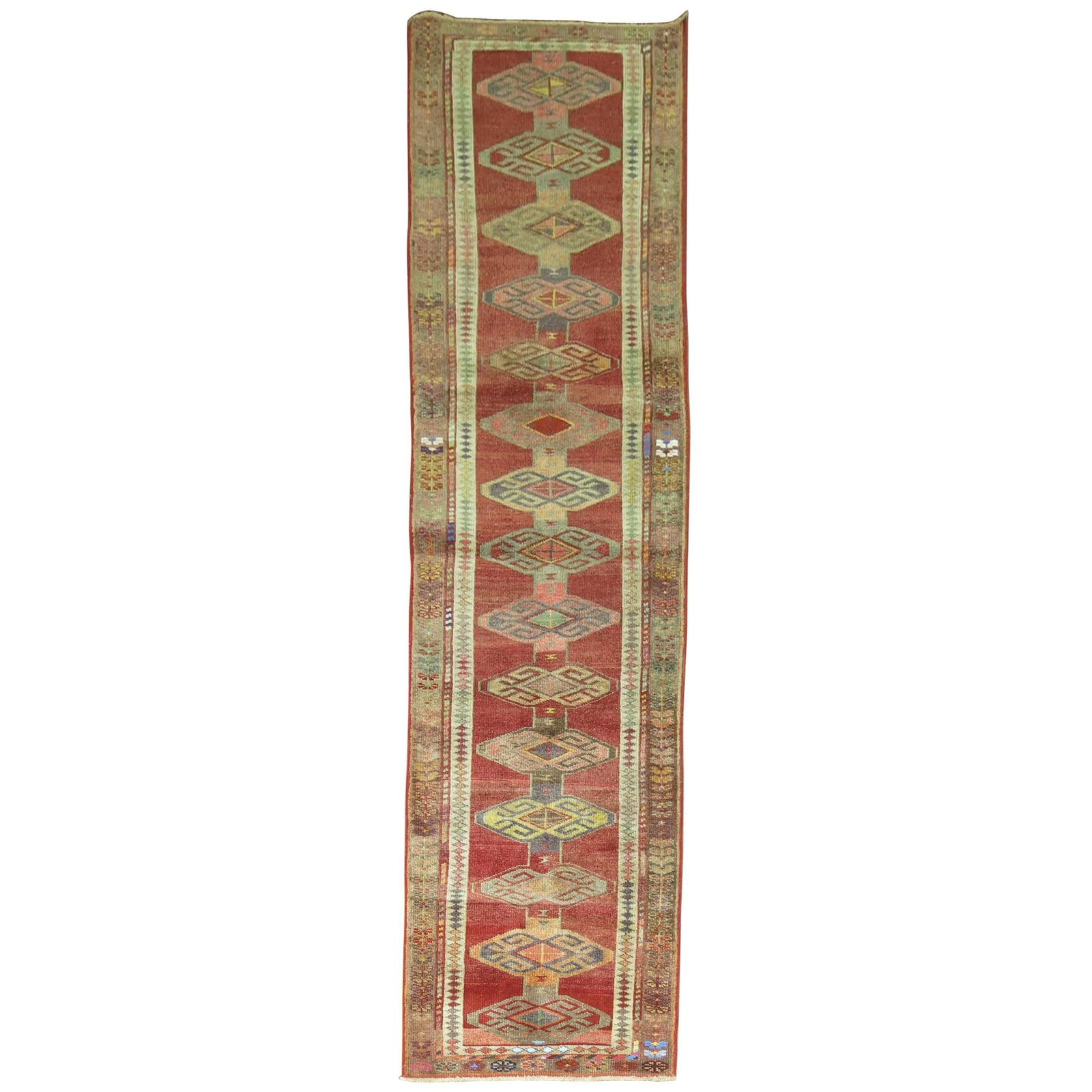Mid Century Armenian Kurd Tribal Wool Hand Knotted Runner: Mid Century Armenian Kurd Tribal Wool Hand Knotted Runner This unique mid-20th century Armenian Kurd runner features a vibrant tribal design. Expertly hand-knotted from wool, it showcases traditional 