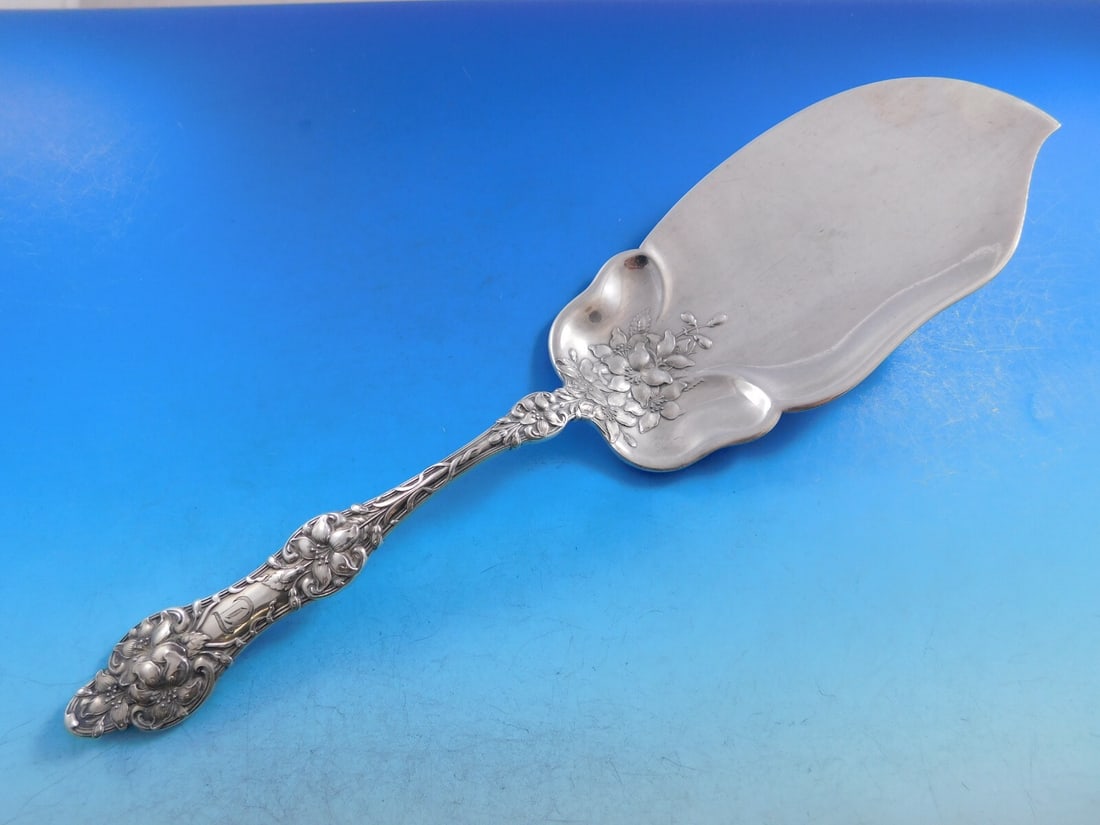 Alvin Old Orange Blossom Sterling Silver Fish Server 11.5 inches: Alvin Old Orange Blossom Sterling Silver Fish Server 11.5 inches This exquisite fish server is crafted from sterling silver and features the elegant Old Orange Blossom pattern by Alvin, dating back to