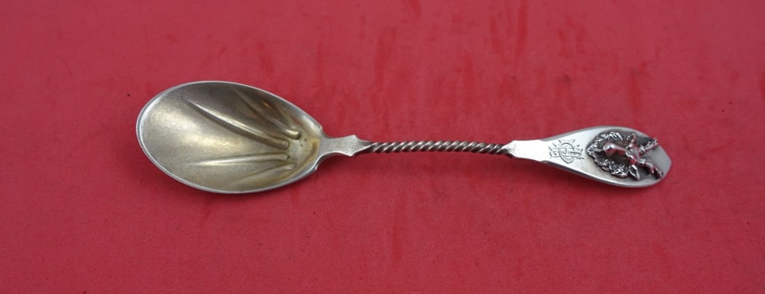 Gorham Saxon Stag Sterling Silver Ice Cream Spoon 6 1/8": Gorham Saxon Stag Sterling Silver Ice Cream Spoon 6 1/8" Indulge in the elegance of the Saxon Stag ice cream spoon by Gorham, a stunning piece crafted from sterling silver. This exquisite spoon, measu