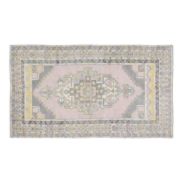 Handmade Anatolian Wool Area Rug in Dove Gray 4'1" x 7'2": Handmade Anatolian Wool Area Rug in Dove Gray 4'1" x 7'2" This vintage Turkish Anatolian hand-knotted wool rug showcases traditional craftsmanship combined with a modern design sensibility. Crafted fr