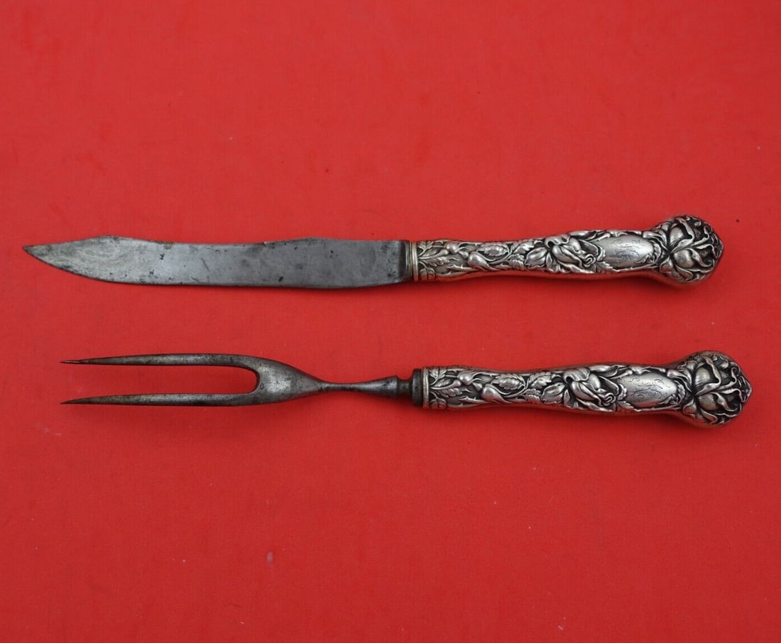 Alvin Bridal Rose Sterling Silver 2pc Steak Carving Set with Carbon Steel: Alvin Bridal Rose Sterling Silver 2pc Steak Carving Set with Carbon Steel This exquisite two-piece steak carving set features the elegant Bridal Rose pattern by Alvin, crafted from sterling silver wit