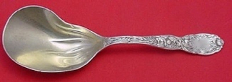 Tiffany & Co. Sterling Silver Chrysanthemum Pattern Berry Spoon Goldwashed Conch 9.5 Inch: Tiffany & Co. Sterling Silver Chrysanthemum Pattern Berry Spoon Goldwashed Conch 9.5 Inch This is a sterling silver berry spoon in the Chrysanthemum pattern by Tiffany & Co., featuring a goldwashed co