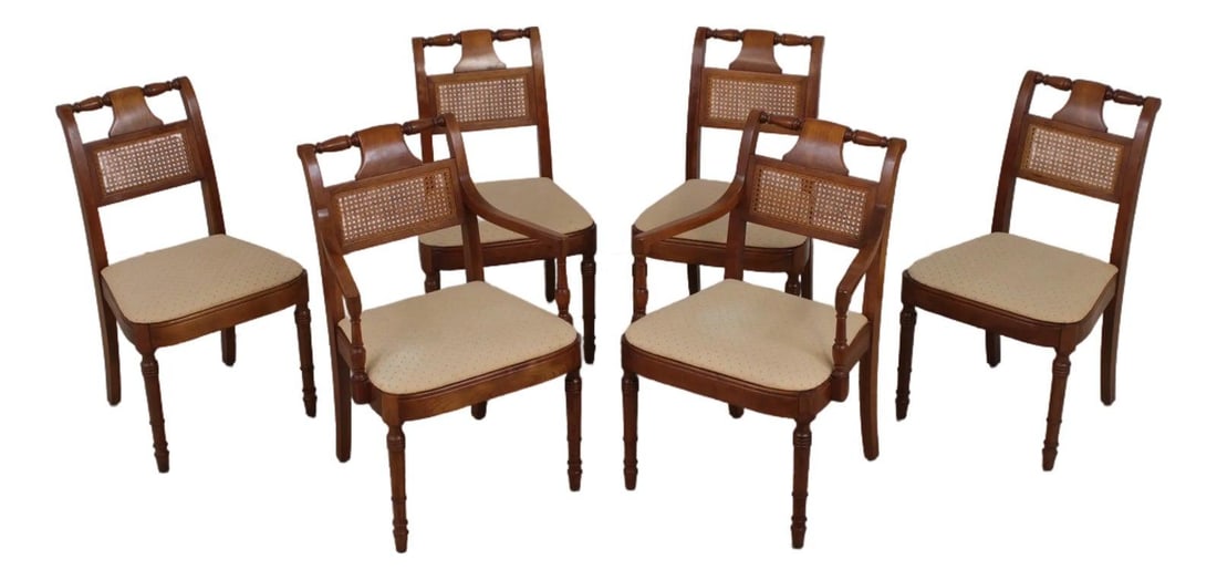 6 Stickley cherry wood cane back dining chairs Set of 6: 6 Stickley cherry wood cane back dining chairs Set of 6 This set of six Stickley dining chairs, crafted circa 1964, features solid cherry wood construction with finely carved details and traditional t