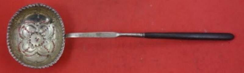 Coin Silver Sugar Sifter 8 5/8 Serving Piece Flower Design: Coin Silver Sugar Sifter 8 5/8 Serving Piece Flower Design This exquisite coin silver sugar sifter showcases a beautiful flower design in its bowl. Measuring 8 5/8 inches, this serving piece is crafte