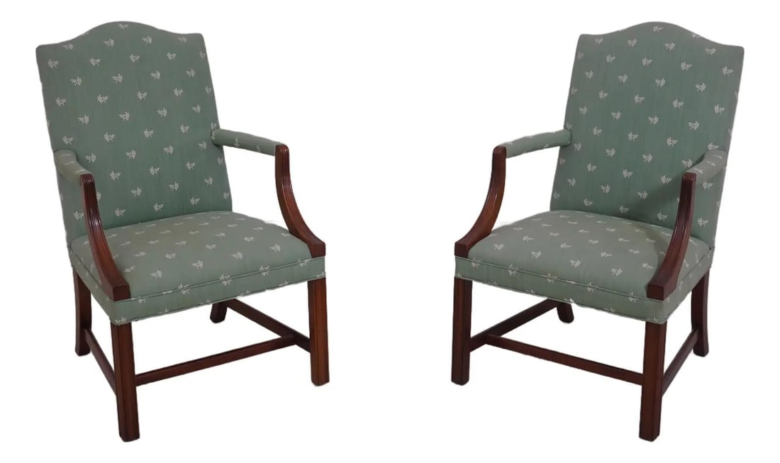 Elegant Pair of Southwood Chippendale Mahogany Armchairs: Elegant Pair of Southwood Chippendale Mahogany Armchairs This exquisite pair of Southwood Chippendale library armchairs showcases a classic 18th-century design, crafted from solid mahogany for durabil