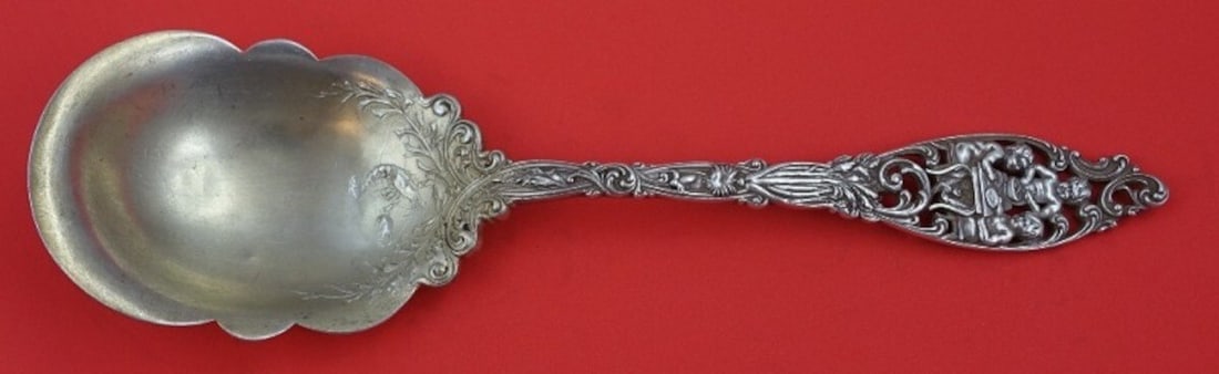 Dominick & Haff Labors of Cupid Sterling Silver Berry Spoon 9 3/8": Dominick & Haff Labors of Cupid Sterling Silver Berry Spoon 9 3/8" This exquisite serving spoon, crafted by Dominick & Haff, features the elegant Labors of Cupid pattern. Made from high-quality sterli