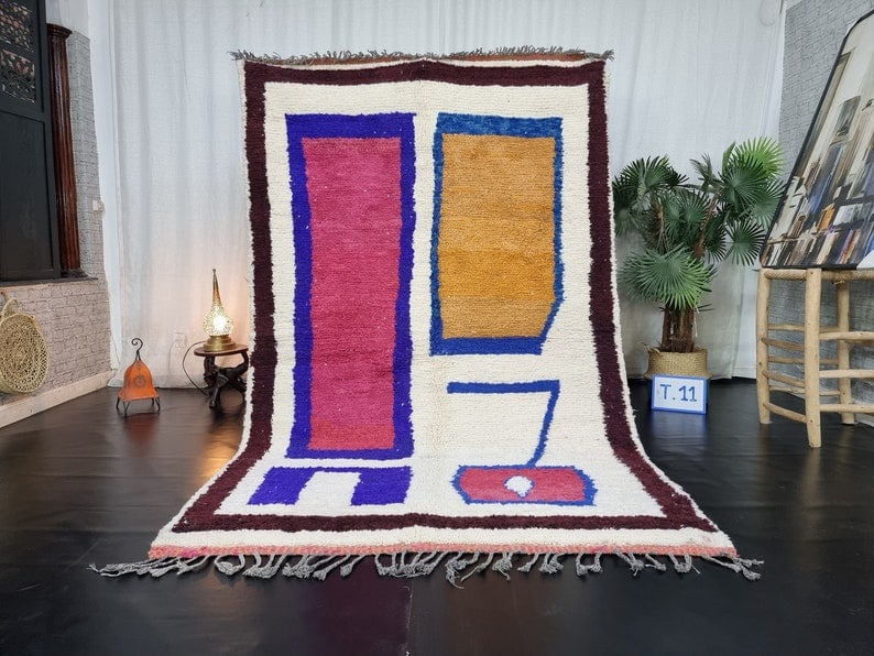 Authentic Handwoven Colorful Moroccan Rug 10 x 5 Feet: Authentic Handwoven Colorful Moroccan Rug 10 x 5 Feet Discover the beauty of this authentic Colorful Rug, handwoven in the Atlas Mountains by skilled local Berber women weavers. Crafted using traditio