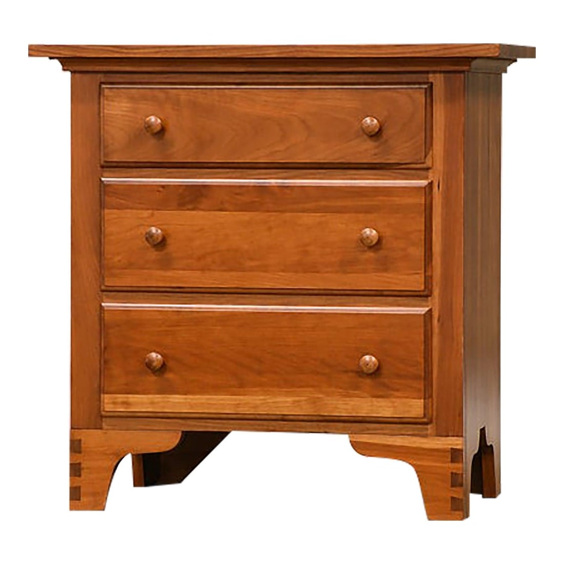 Cherry Wood Three Drawer Nightstand Made in USA: Cherry Wood Three Drawer Nightstand Made in USA This solid cherry nightstand from the 1990s features three drawers with exposed dovetail joints, showcasing quality craftsmanship. It has been professio
