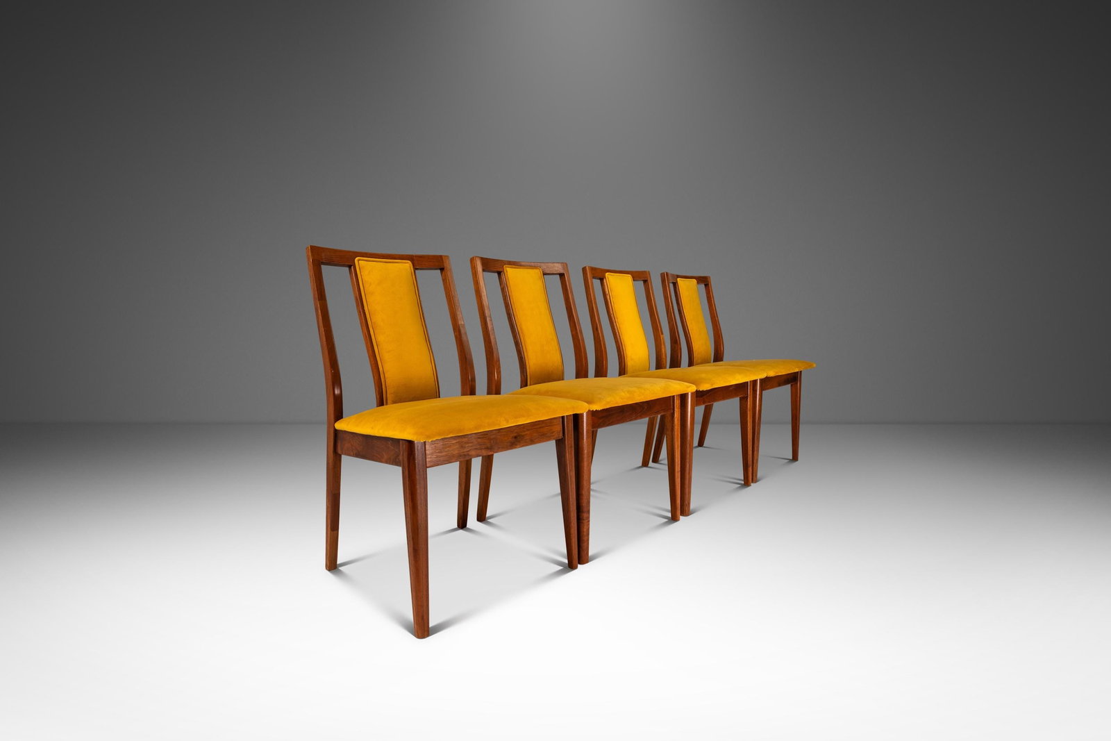 Set of Four 1960s Mid-Century Modern Walnut Dining Chairs in Yellow Felt: Set of Four 1960s Mid-Century Modern Walnut Dining Chairs in Yellow Felt This stunning set of four Mid-Century Modern dining chairs showcases exquisite craftsmanship and design from the 1960s, inspire