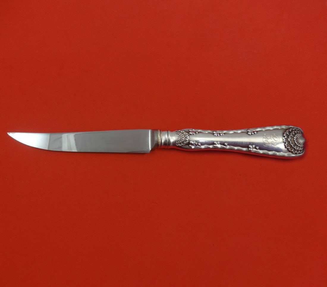 Tiffany & Co Wave Edge Sterling Silver Steak Knife 8.5 Inch Monogrammed: Tiffany & Co Wave Edge Sterling Silver Steak Knife 8.5 Inch Monogrammed Introducing the Wave Edge Steak Knife by Tiffany & Co., a stunning piece crafted from sterling silver with a serrated stainless 