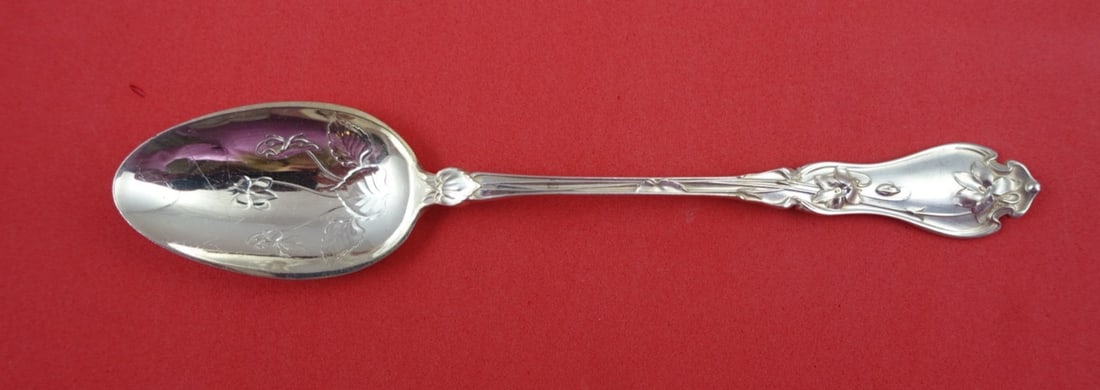 Whiting Violet Sterling Silver Iced Tea Spoon 6 1/4": Whiting Violet Sterling Silver Iced Tea Spoon 6 1/4" This exquisite iced tea spoon features the elegant 'Violet' pattern by Whiting, showcasing beautifully detailed violets in the bowl. Crafted from h