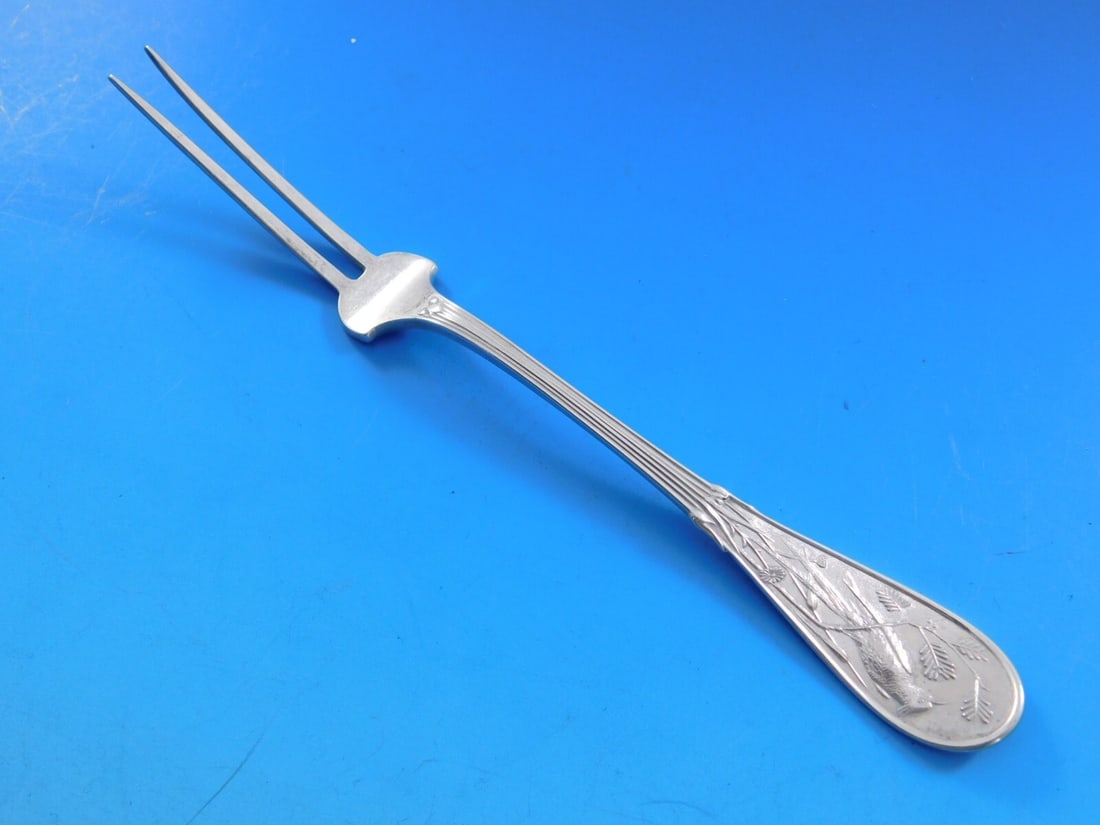 Tiffany & Co Japanese Sterling Silver Fruit Fork 2-Tine 6.25 inches: Tiffany & Co Japanese Sterling Silver Fruit Fork 2-Tine 6.25 inches This exquisite Japanese pattern fruit fork by Tiffany & Co. showcases remarkable craftsmanship and elegance. Made from high-quality 