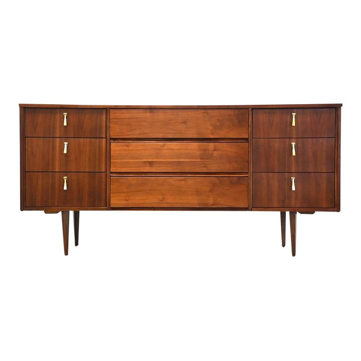Mid Century Modern Walnut Dresser with Brass Accents 64.25": Mid Century Modern Walnut Dresser with Brass Accents 64.25" This exquisite mid-century modern dresser showcases a stunning walnut finish complemented by polished brass accents. Professionally refinish