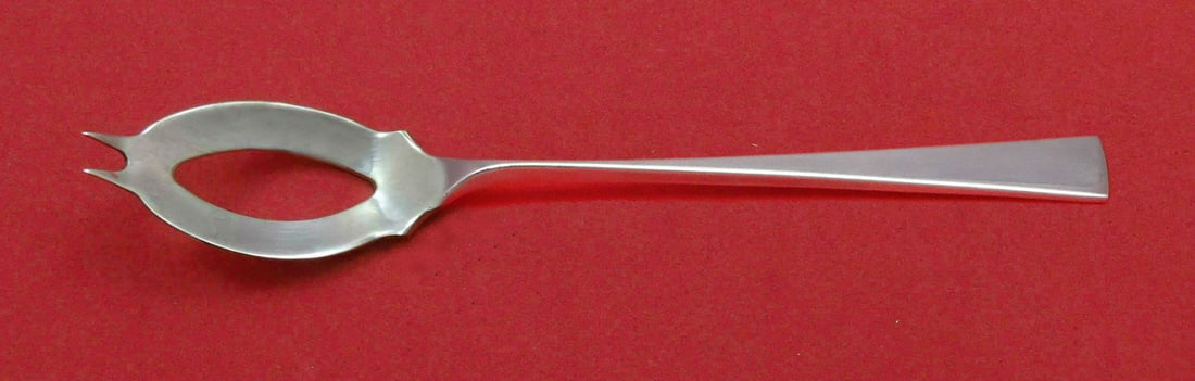 Reed and Barton Dimension sterling silver olive serving spoon 5 3/4 in: Reed and Barton Dimension sterling silver olive serving spoon 5 3/4 in Sterling silver olive spoon by Reed & Barton in the Dimension pattern. This custom made Ideal spoon measures 5 3/4 inches, was ma