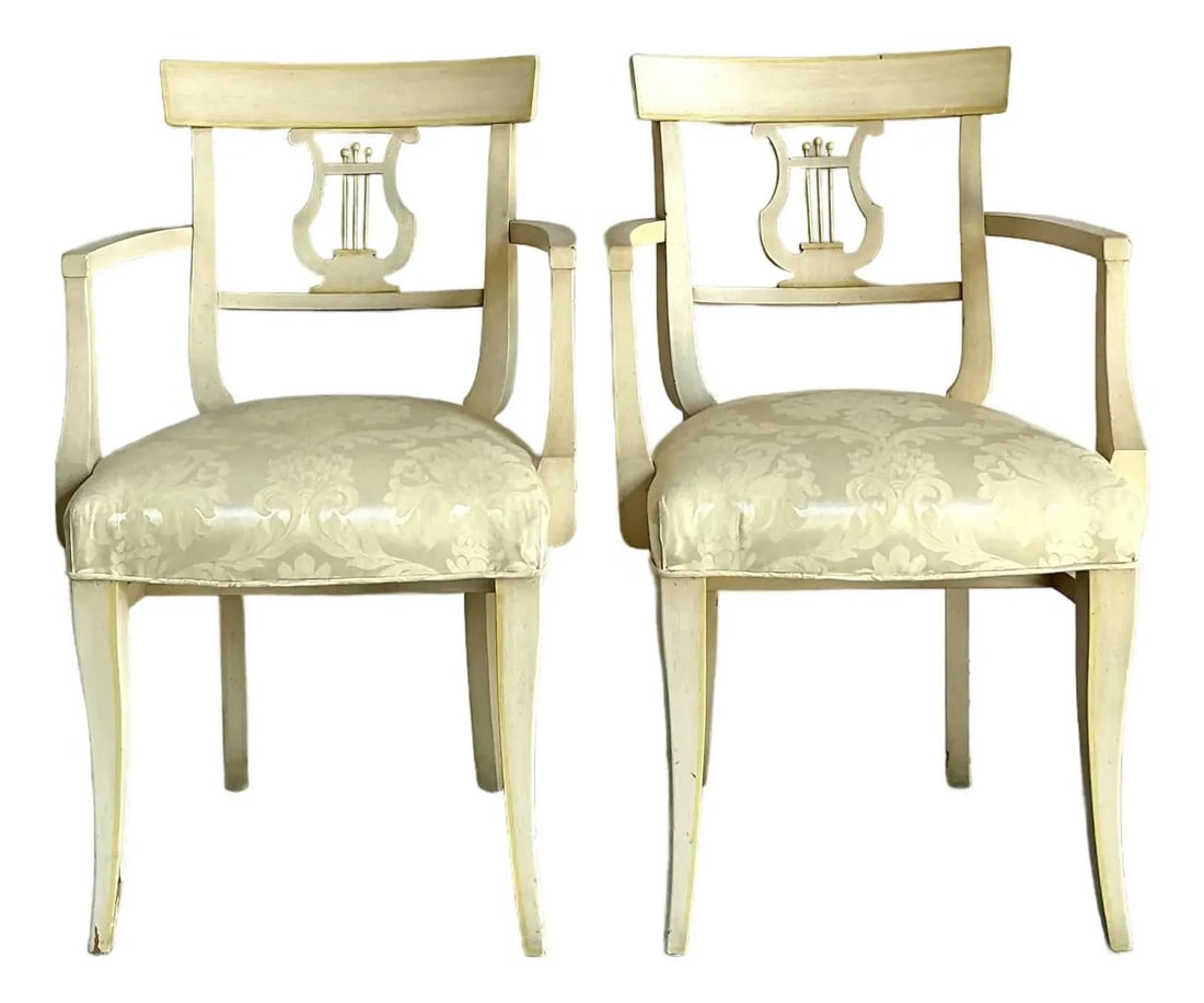 Pair of Lyre Back Klismos Armchairs in Regency Style with Cream Damask Upholstery: Pair of Lyre Back Klismos Armchairs in Regency Style with Cream Damask Upholstery This exceptional pair of vintage armchairs is inspired by the Neoclassical Empire and Klismos styles, featuring gently
