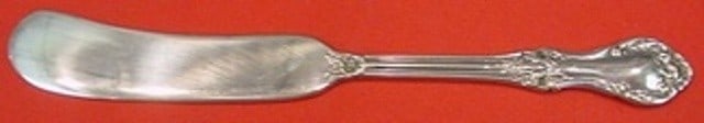 International Sterling Silver Wild Rose Butter Spreader 5 3/4": International Sterling Silver Wild Rose Butter Spreader 5 3/4" This exquisite butter spreader features a flat handle and is crafted from sterling silver, showcasing the elegant Wild Rose pattern by In