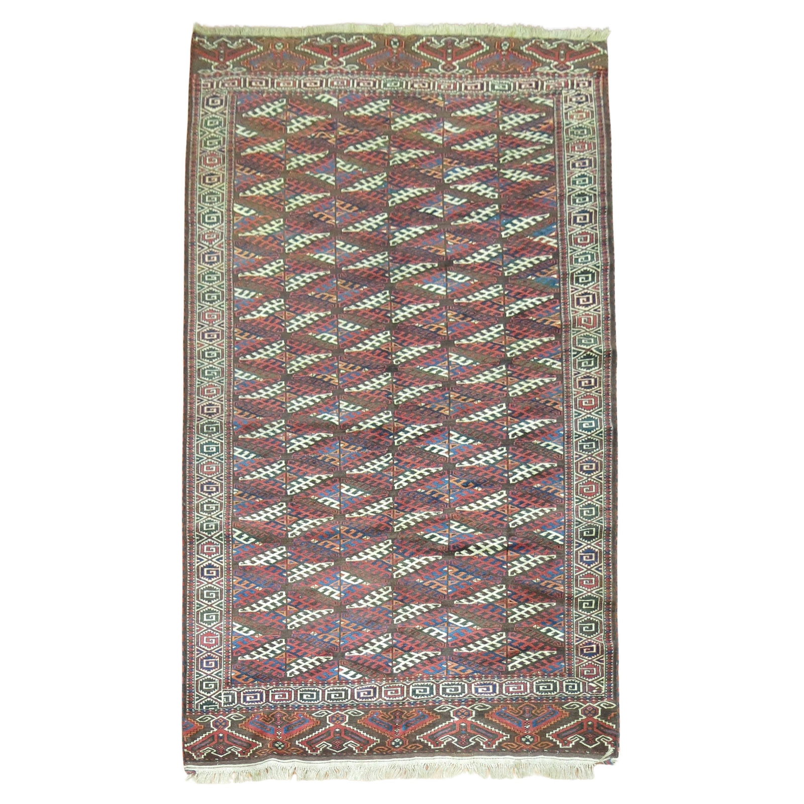 Zabihi Collection Tribal Antique Turkeman Rug 80 x 130 Hand-Woven Wool: Zabihi Collection Tribal Antique Turkeman Rug 80 x 130 Hand-Woven Wool Discover the beauty of this classic Antique Turkoman Rug, hand-woven from wool in the early 20th century. This stunning piece sho
