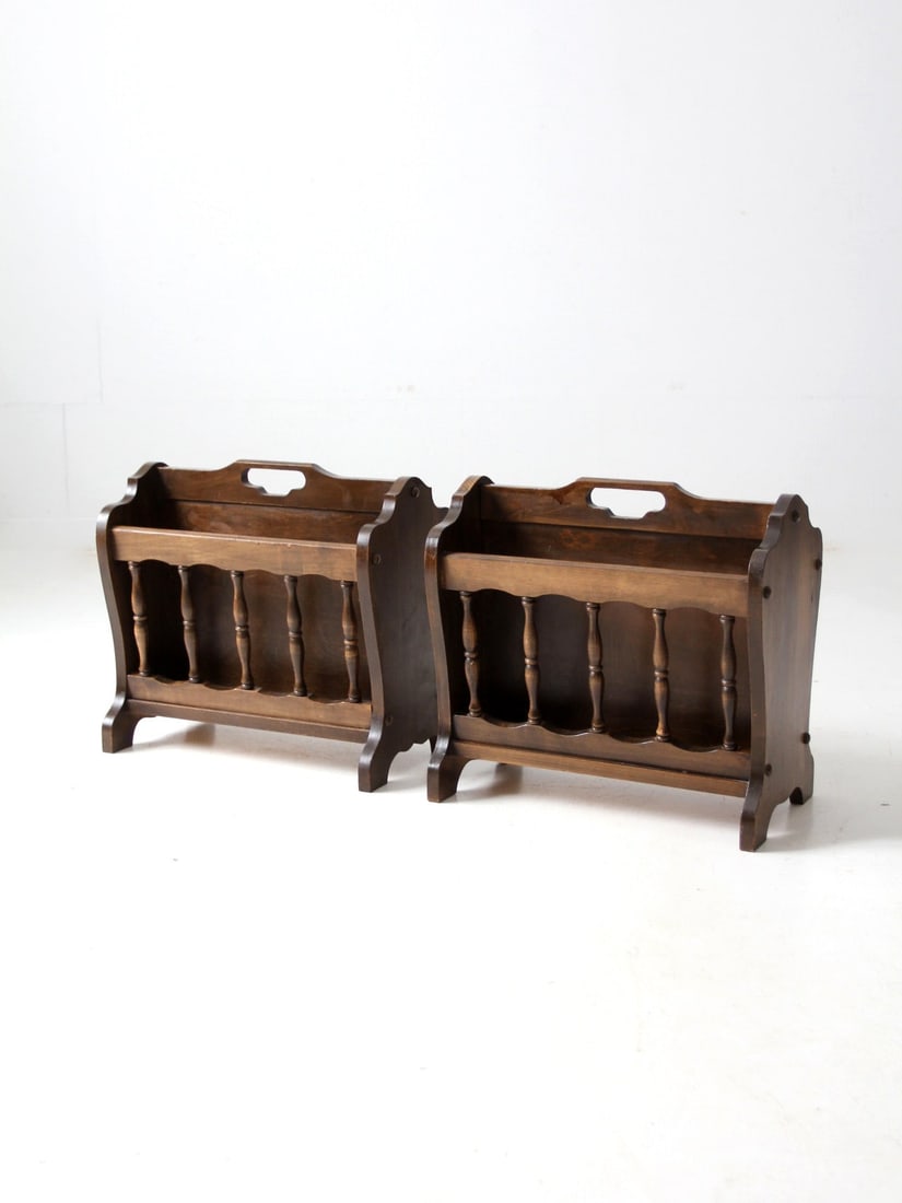 Pair of Vintage Leick Mid-Century Magazine Racks with Spindles: Pair of Vintage Leick Mid-Century Magazine Racks with Spindles Enhance your living space with this pair of vintage Leick magazine racks, designed in a charming mid-century style. These hand-crafted lo