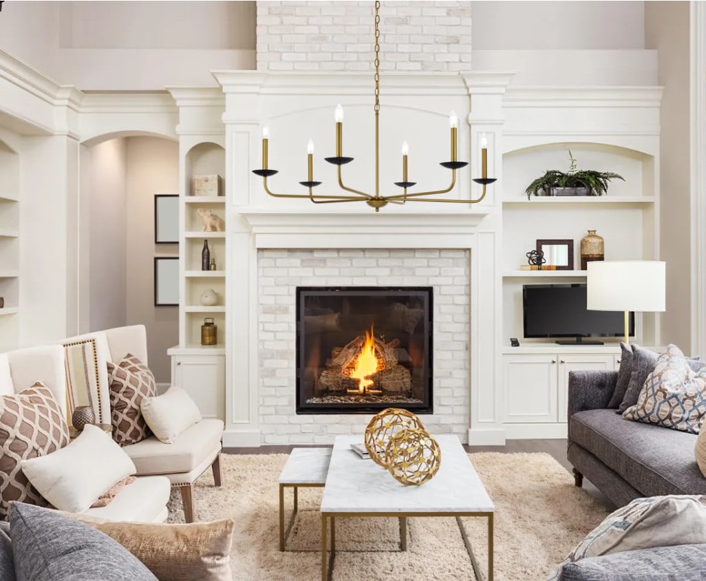 Living District 6 Light Brass Black Iron Chandelier 42 Inch: Living District 6 Light Brass Black Iron Chandelier 42 Inch This chandelier features a striking brass and black metal frame with six lights, designed in the style of wrought iron with a mid-century mo