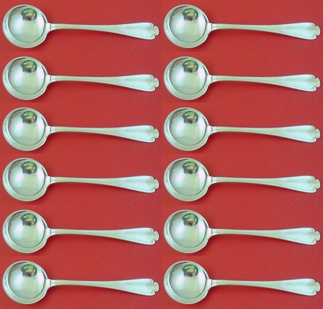 Tiffany & Co. Flemish Sterling Silver Bouillon Spoon Set of 12pcs: Tiffany & Co. Flemish Sterling Silver Bouillon Spoon Set of 12pcs Introducing a stunning set of 12 bouillon soup spoons in the elegant Flemish pattern by Tiffany & Co. Each spoon measures 5 3/8 inches