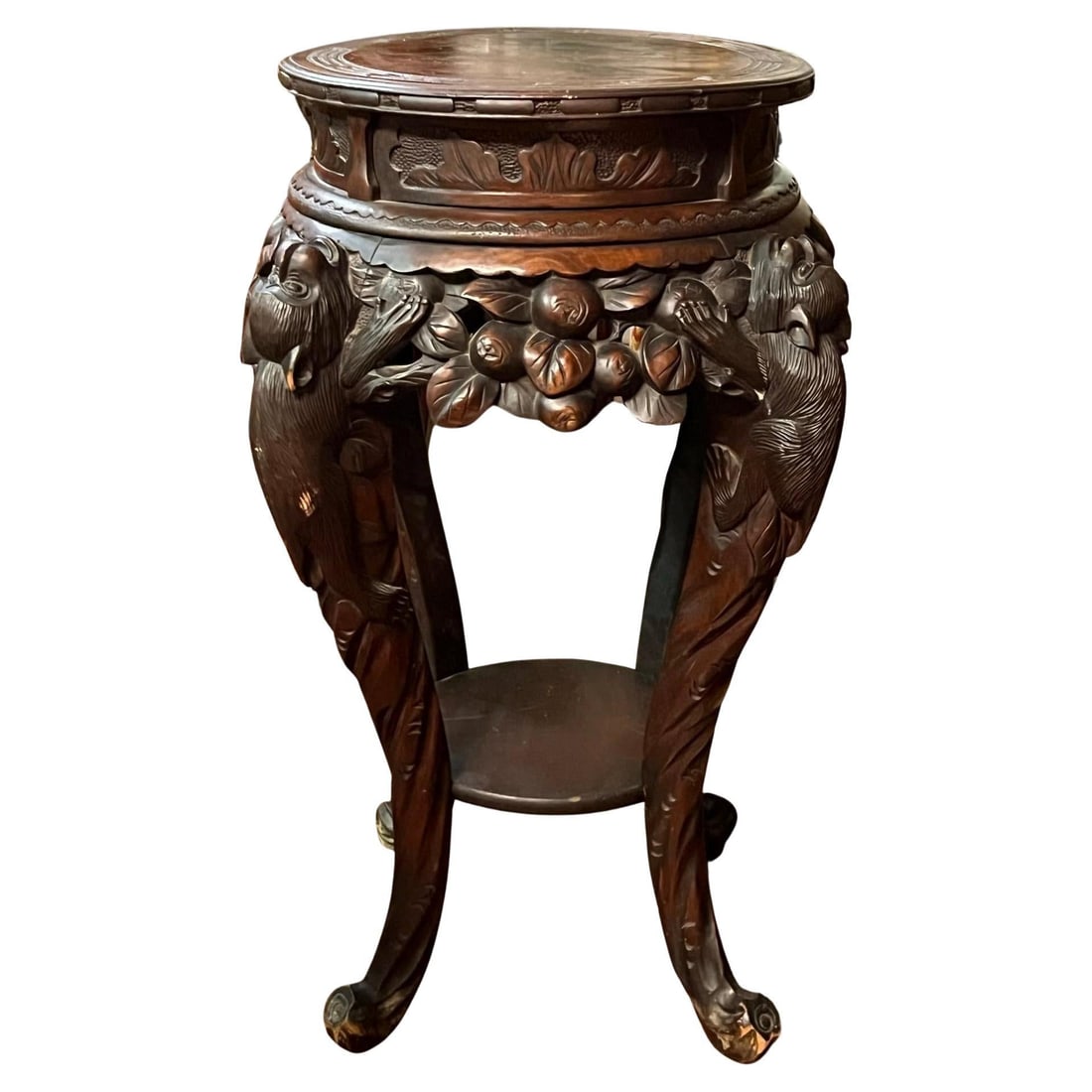 Chinese Rosewood Table with Carved Monkey and Fruit Motif circa 1890: Chinese Rosewood Table with Carved Monkey and Fruit Motif circa 1890 This antique Chinese side table or plant stand is finely hand-carved from rosewood and features intricate designs of monkeys climbi