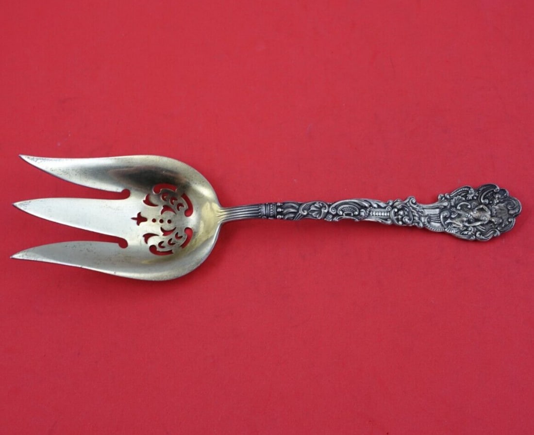 Gorham Versailles Sterling Silver 3 Tine Pierced Salad Serving Fork 8 3/4: Gorham Versailles Sterling Silver 3 Tine Pierced Salad Serving Fork 8 3/4 A sterling silver salad serving fork in the Versailles pattern by Gorham. It features a 3-tine pierced design, gold washed fin
