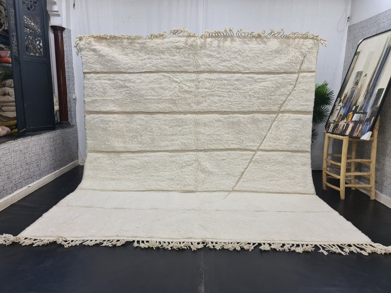 Authentic White Handmade Engraved Wool Rug from Morocco 9.84 x 8.20 Feet: Authentic White Handmade Engraved Wool Rug from Morocco 9.84 x 8.20 Feet Discover the beauty of this authentic soft white handmade rug, featuring elegantly engraved lines. Handwoven by skilled Berber 