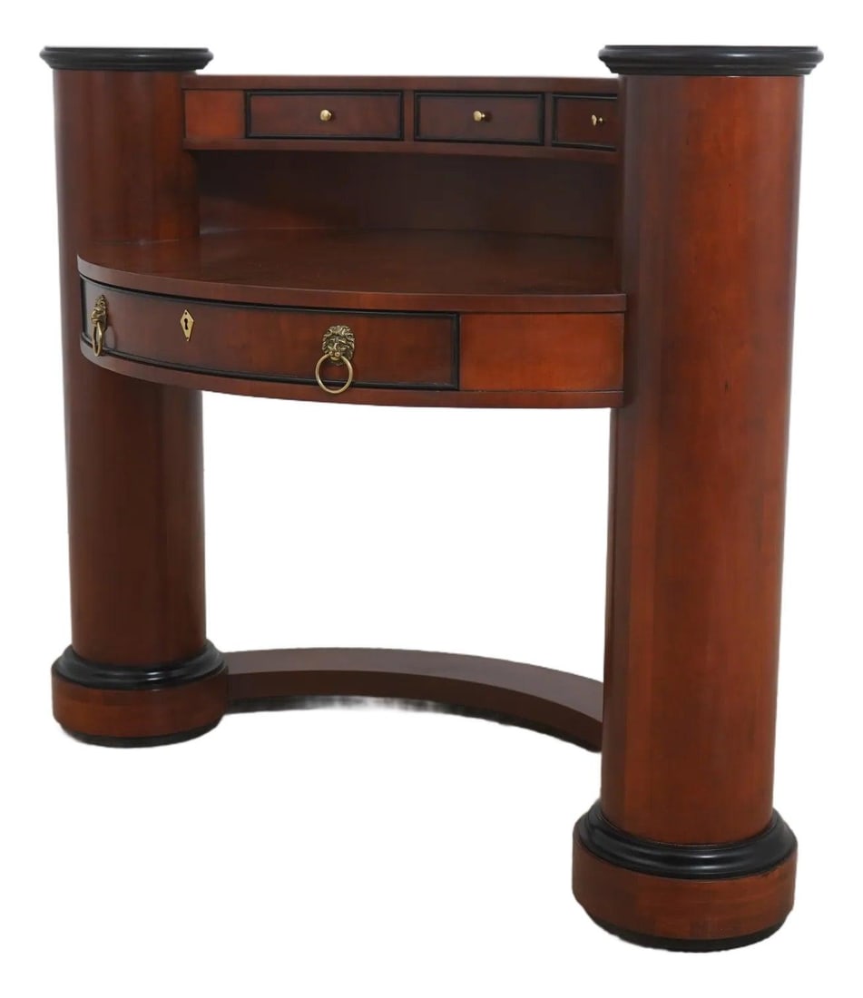 Century Empire Cherry Wood Writing Desk with Lion Head Brass Pulls: Century Empire Cherry Wood Writing Desk with Lion Head Brass Pulls This French Empire style writing desk is crafted from cherry wood and features elegant black detailing and classic column sides. The 