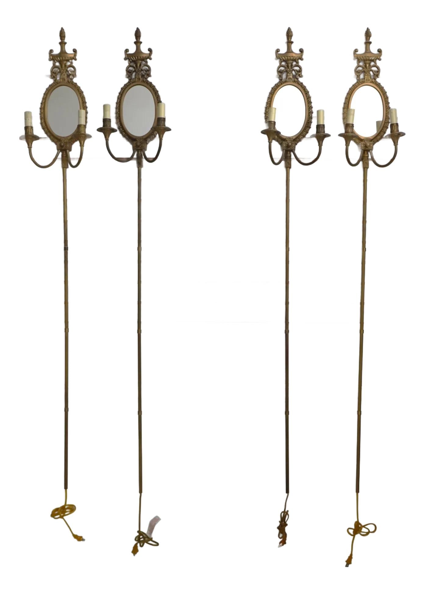 Elegant Set of 4 Brass Lighted Regency Wall Sconces: Elegant Set of 4 Brass Lighted Regency Wall Sconces Enhance your living space with this elegant set of 4 Regency Style Brass Mirrored & Lighted Wall Sconces. Crafted approximately 50 years ago, these 