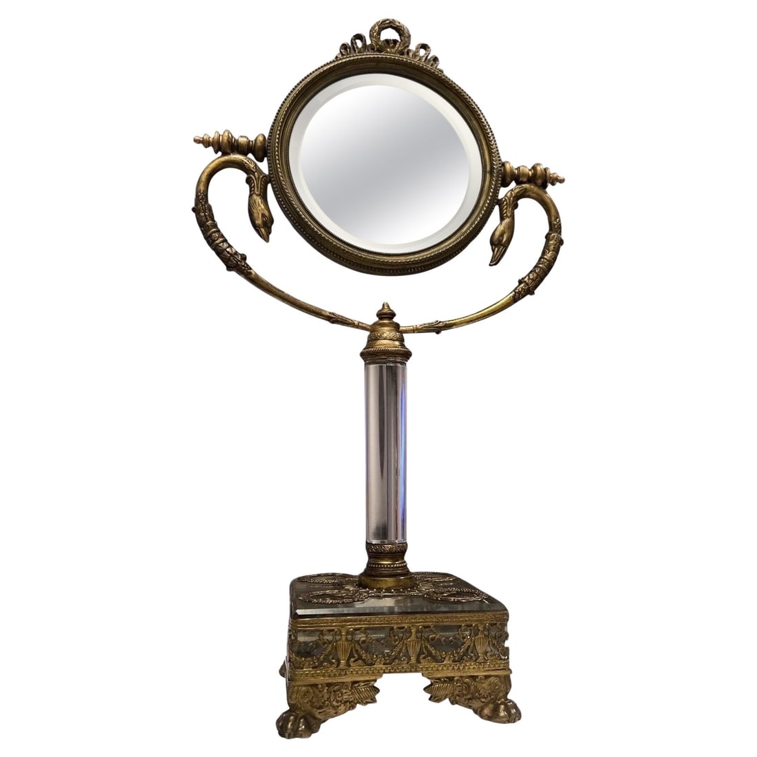 19th Century Neoclassical Gilt Bronze Glass Vanity Mirror with Swan Supports: 19th Century Neoclassical Gilt Bronze Glass Vanity Mirror with Swan Supports This exquisite antique Neoclassical vanity mirror showcases a stunning design from early to mid 19th century France. Standi